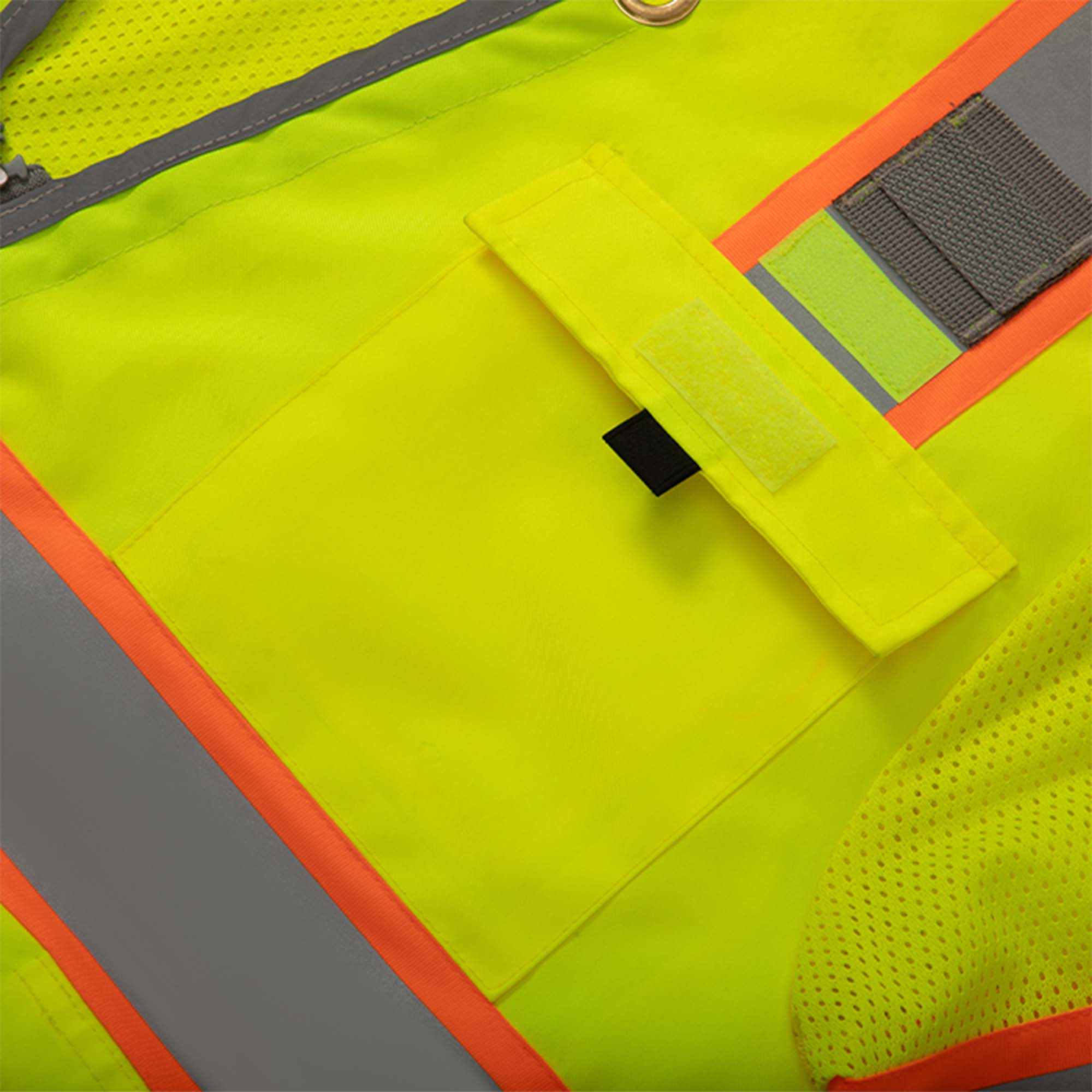 Class 3 surveyor vest with reflective stripes and multiple pockets.