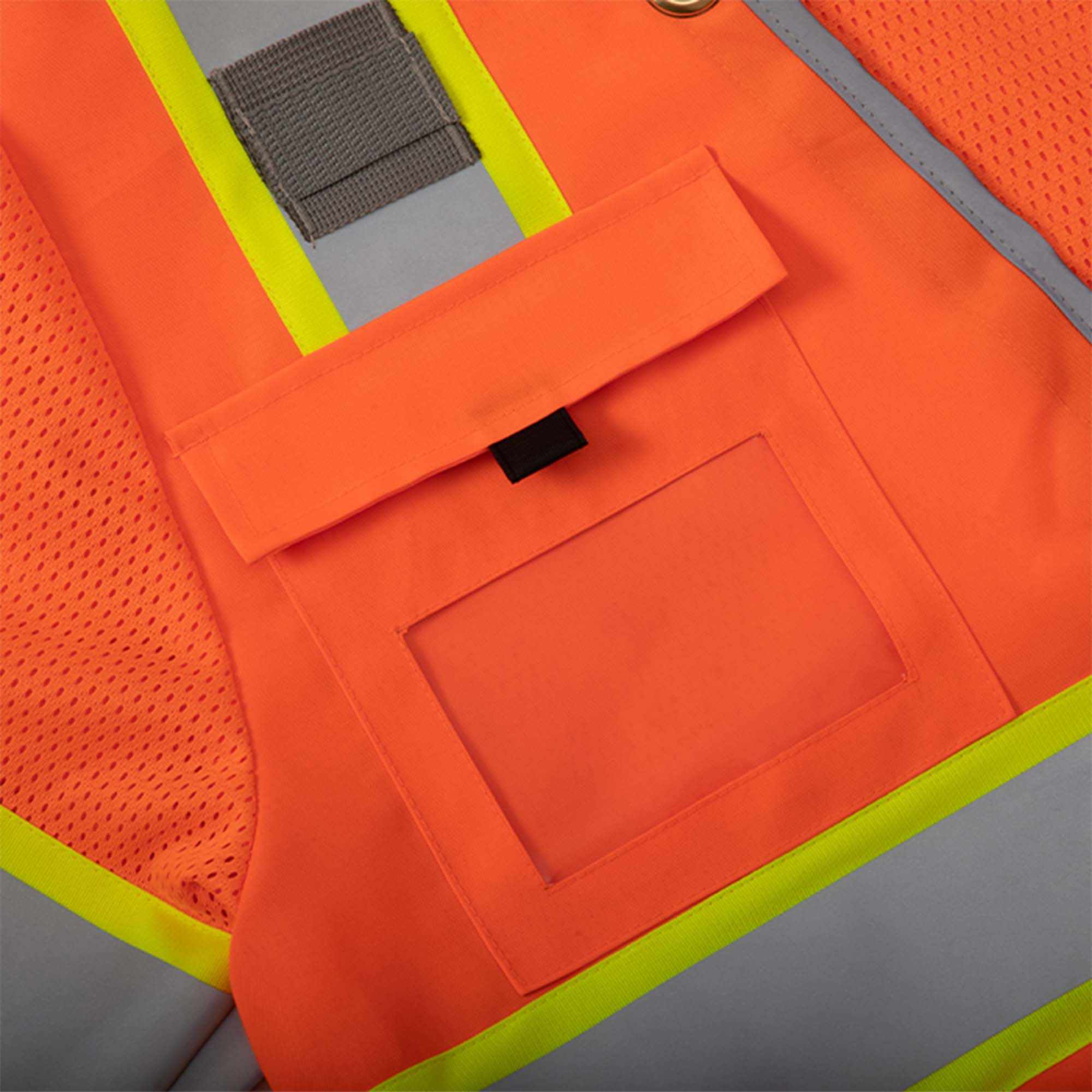 Class 3 surveyor vest with reflective stripes and multiple pockets.